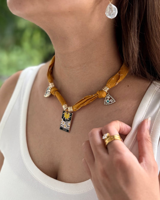 ECLIPSE CHARM NECKLACE