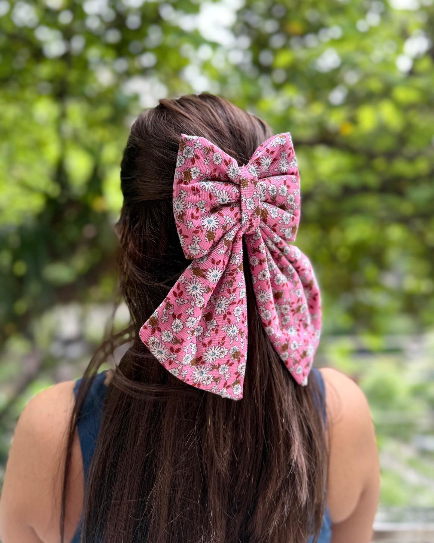 POWDER PINK PIGTAIL BOW