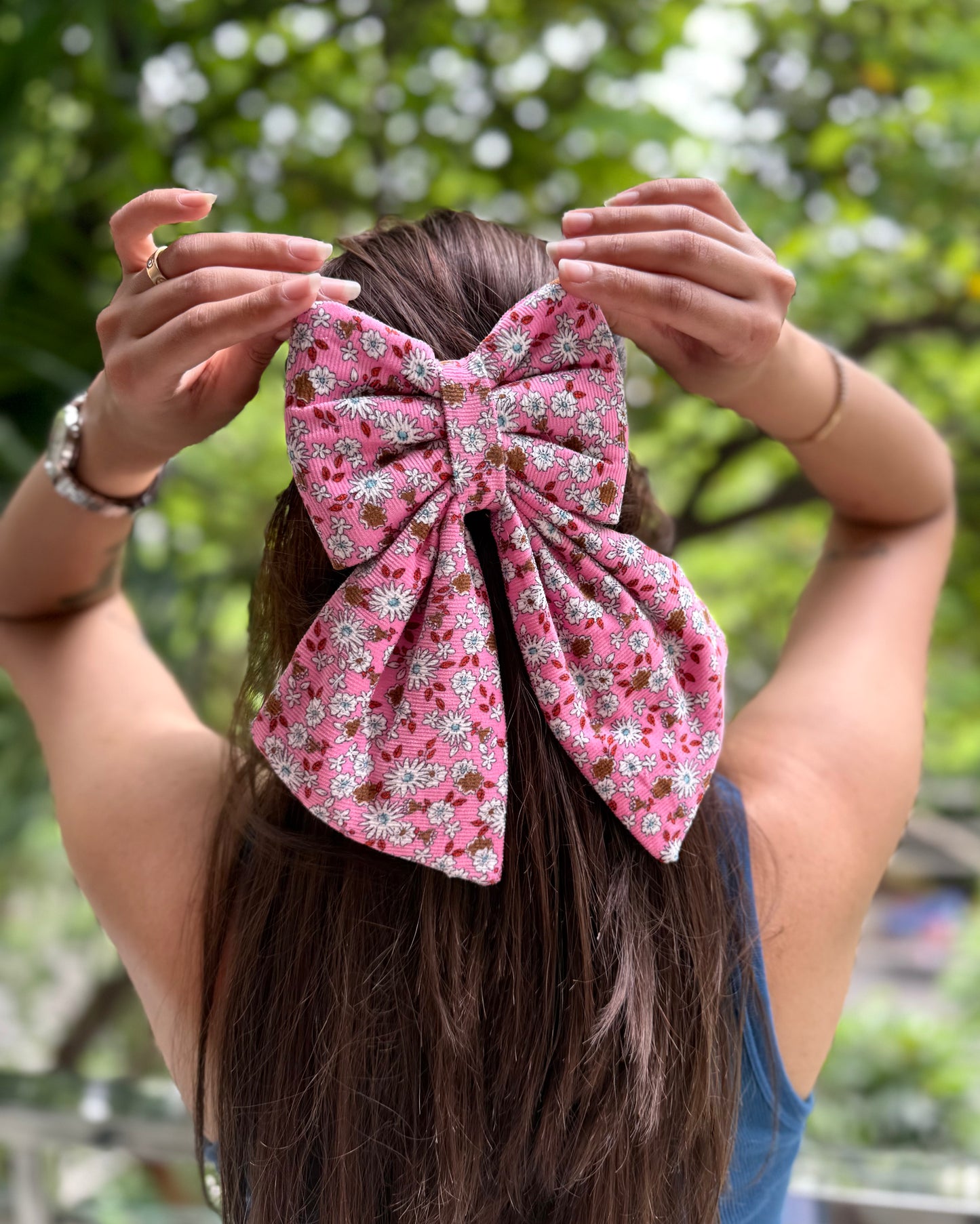 POWDER PINK PIGTAIL BOW