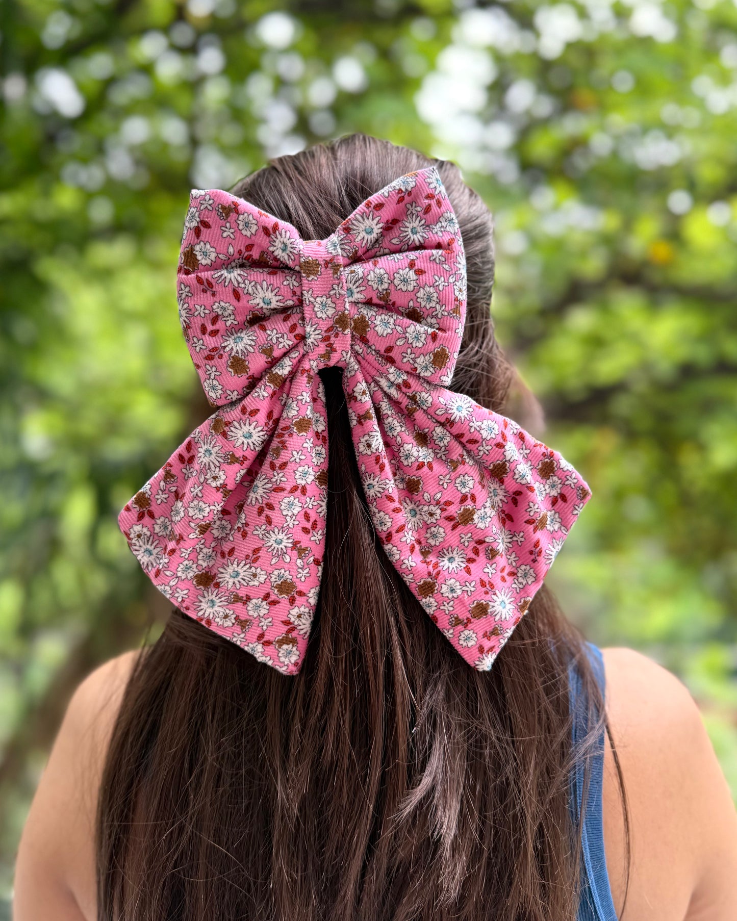 POWDER PINK PIGTAIL BOW