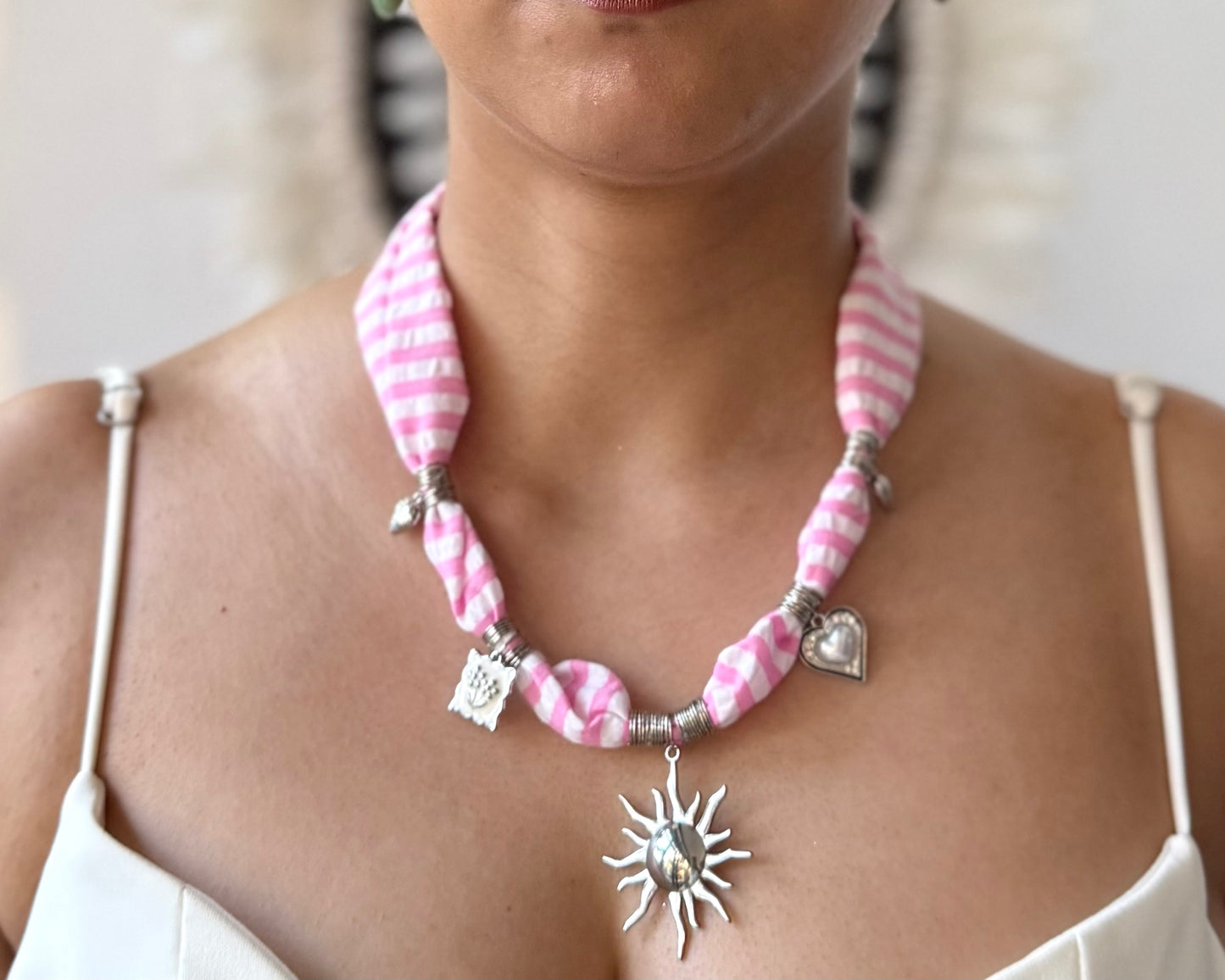 SILVER SUN CHARM NECKLACE